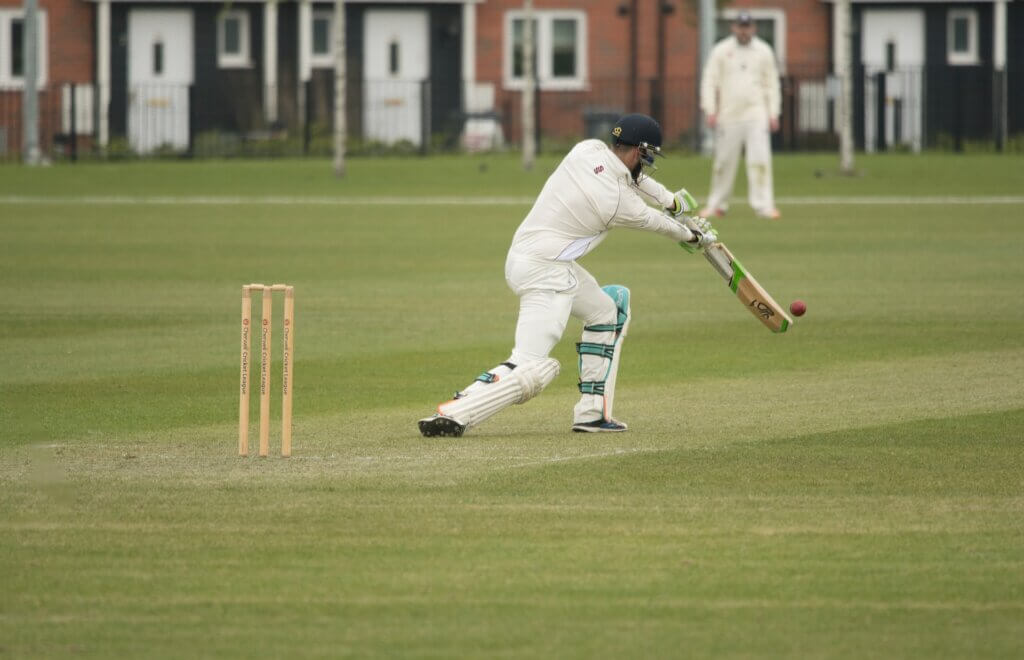 cricket player in white uniform