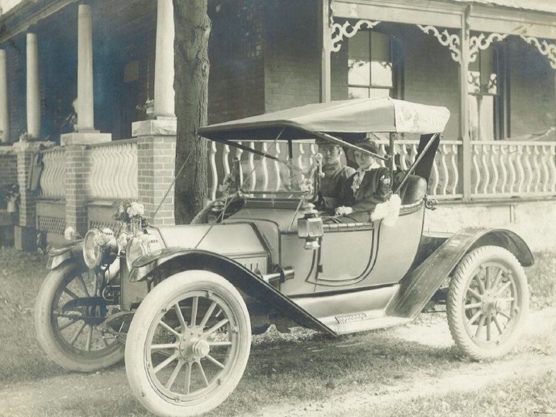 Mr. & Mrs. Gallaugher in car on wedding day, Mulmur, 1915