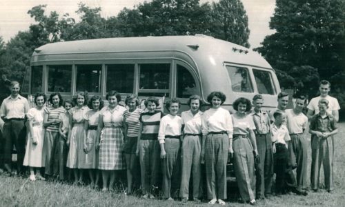 Historic picture of students on a field trip posed with bus, MoD Collection, P-3856-0074